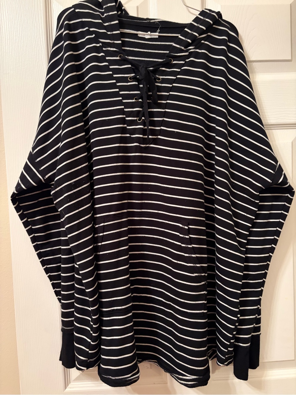 Maurices Black and White Striped Lace-Up Hoodie with front pocket.